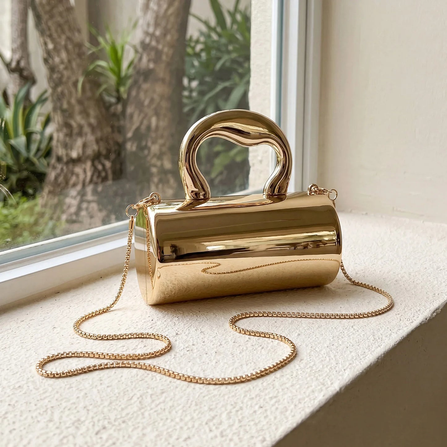 Stylish designer mini acrylic gold cylindrical clutch sparkly party bag