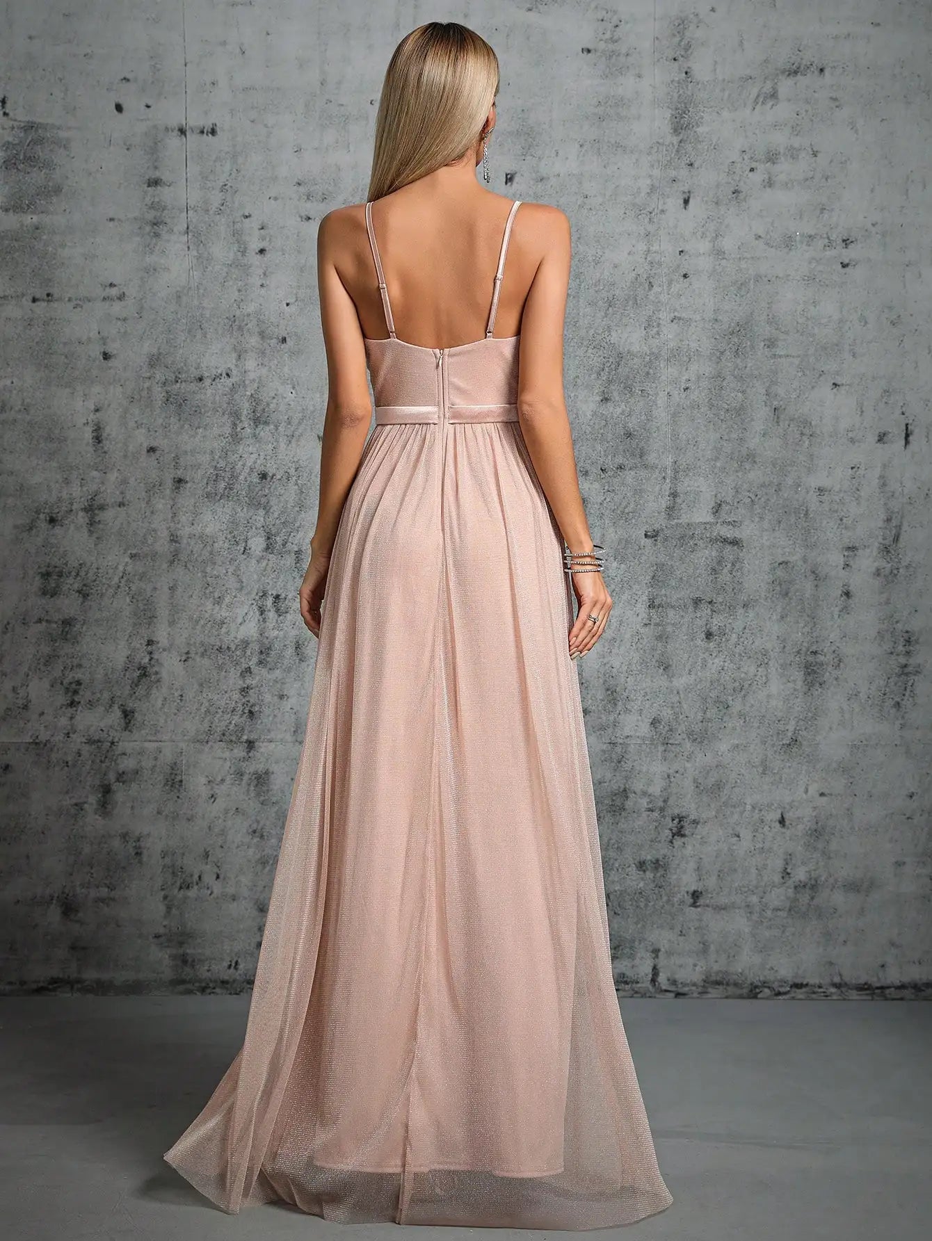 A deep V-bra design with a mesh slit long dress